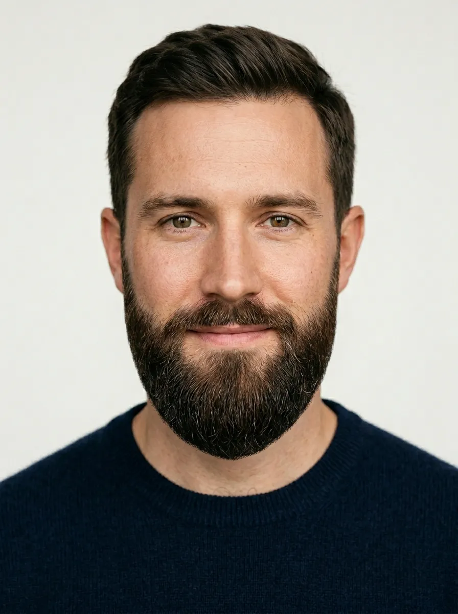 A man with a refined ducktail beard