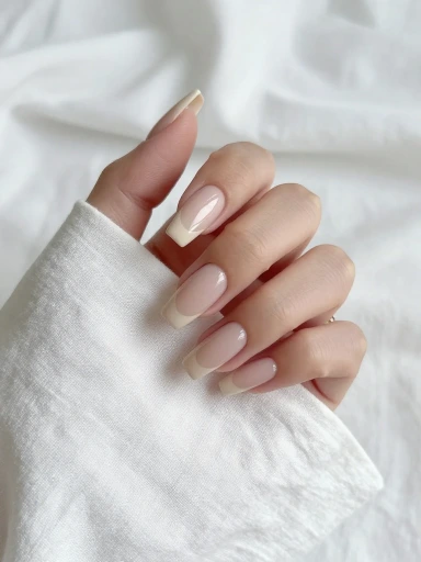 Elegant French Tip Nails with a Modern Twist