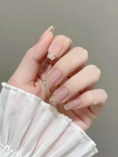 Elegant Almond-Shaped Polka Dot Nails