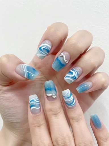 Beach-Inspired Nail Designs with Coastal Charm