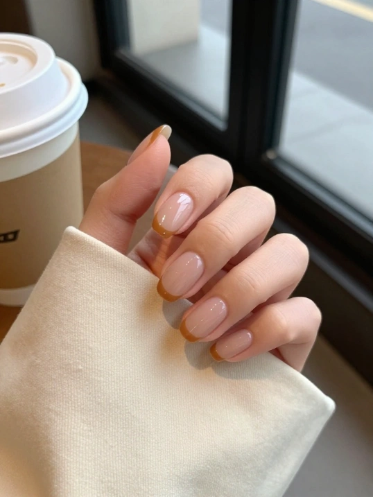5. Caramel French Tips for a Soft Fall Manicure