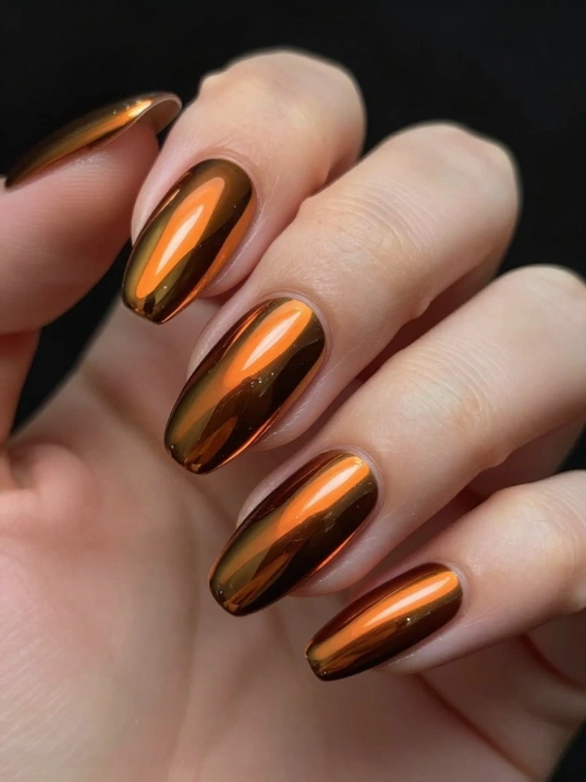 9. Brown Chrome Nails for a Modern Metallic Finish